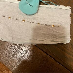 tiffany&CO bracelet. no signs of use, white and yellow gold!